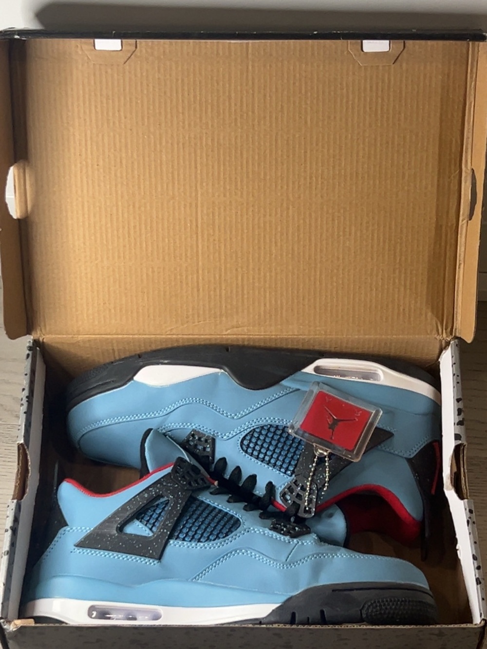 Jordan Men's Sneakers in Light Blue with Red Accents